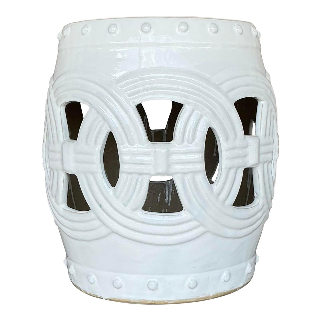 Vintage Regency White Ceramic Low Stool with Openwork Design: Vintage Regency White Ceramic Low Stool with Openwork Design This vintage Regency-style ceramic stool showcases a beautifully glazed white finish complemented by intricate openwork detailing. The time
