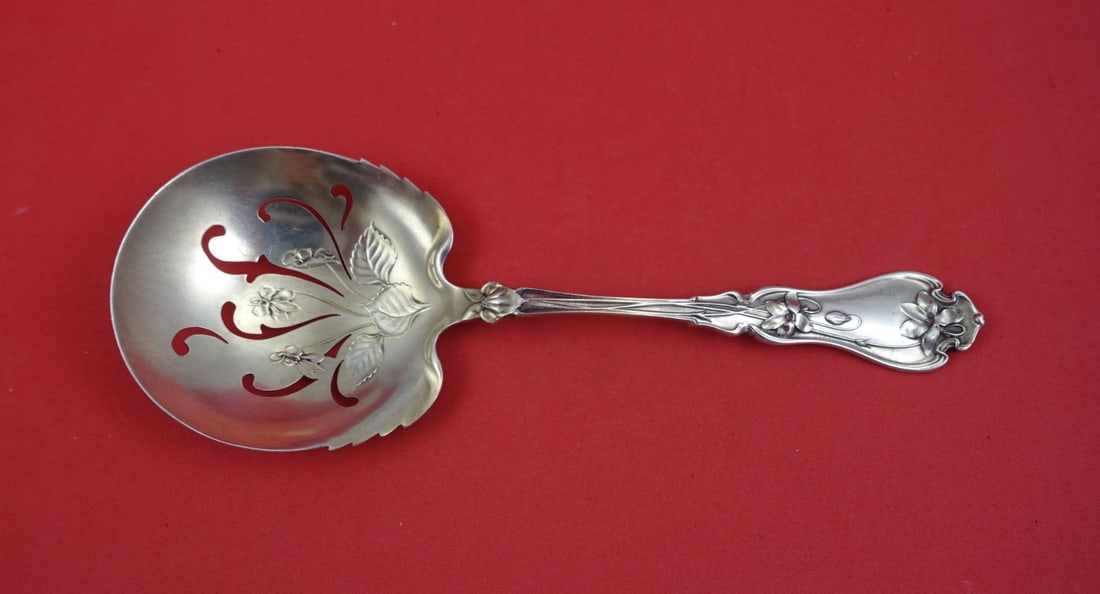 Sterling Silver Serving Spoon Violet Pattern 8 3/4 Inch: Sterling Silver Serving Spoon Violet Pattern 8 3/4 Inch This is a Whiting serving spoon in the Violet pattern, crafted from sterling silver. The pea spoon measures 8 3/4 inches in length and is not mo