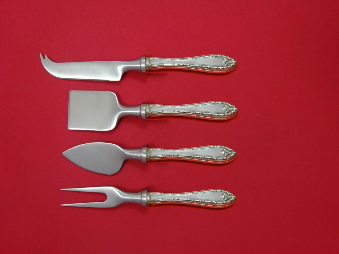 Dominick & Haff Marie Antoinette 4pc Sterling Cheese Serving Set: Dominick & Haff Marie Antoinette 4pc Sterling Cheese Serving Set Elevate your cheese serving experience with this exquisite 4-piece cheese serving set, crafted by Dominick & Haff in the elegant Marie 