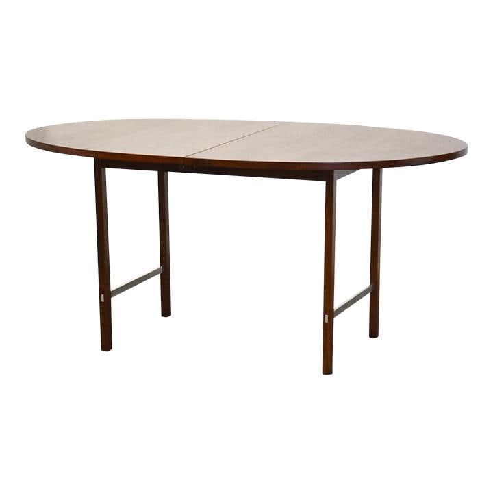 Paul McCobb Walnut Oval Dining Table for Calvin Furniture: Paul McCobb Walnut Oval Dining Table for Calvin Furniture Discover this stunning mid-century modern walnut dining table, designed by Paul McCobb for Calvin Furniture. Featuring an elegant oval shape a