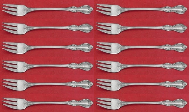Towle Debussy Sterling Silver Cocktail Fork Set 12 Pieces: Towle Debussy Sterling Silver Cocktail Fork Set 12 Pieces This exquisite 12-piece cocktail fork set by Towle showcases the elegant Debussy pattern. Each fork measures 5 5/8" and is crafted from high-q
