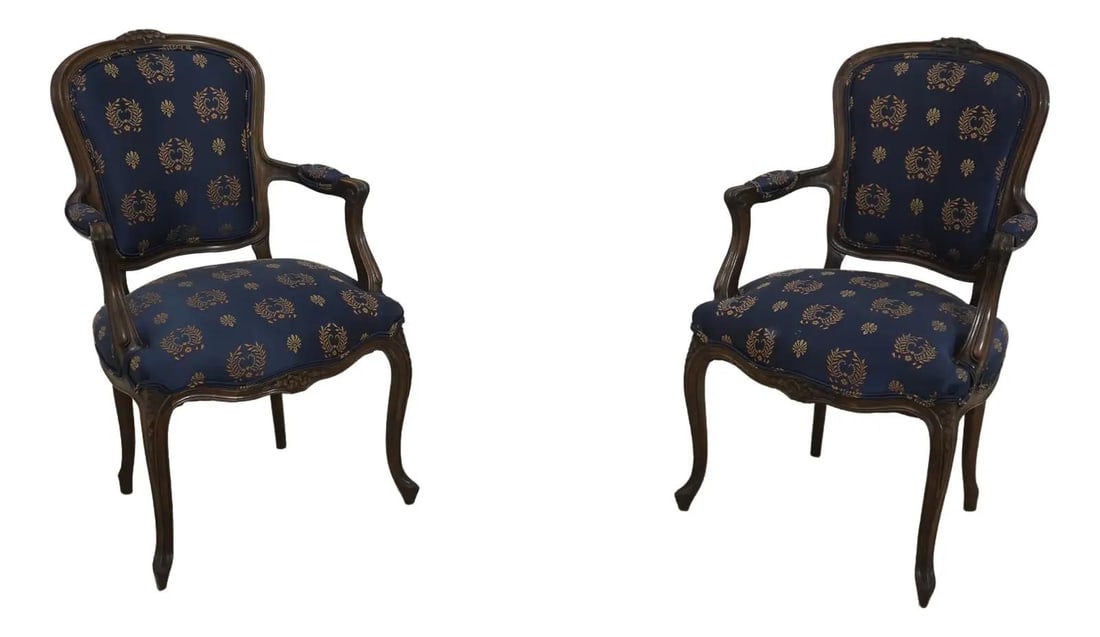 Vintage French Louis XV Style Open Arm Chairs Walnut Finish Pair: Vintage French Louis XV Style Open Arm Chairs Walnut Finish Pair This exquisite pair of vintage French Louis XV style open arm upholstered chairs, dating back to the 1930s, showcases fine carved detai