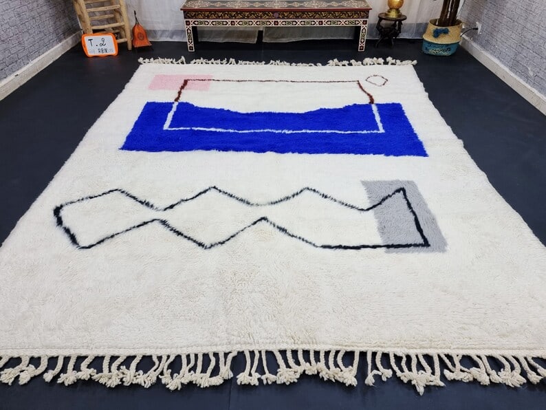 Handwoven Moroccan Soft Rug 100% Sheep Wool 10 x 6.56 Feet: Handwoven Moroccan Soft Rug 100% Sheep Wool 10 x 6.56 Feet Enhance your living space with this Stylish Authentic Soft Rug, handwoven in the Atlas Mountains by local Berber women weavers. Crafted using