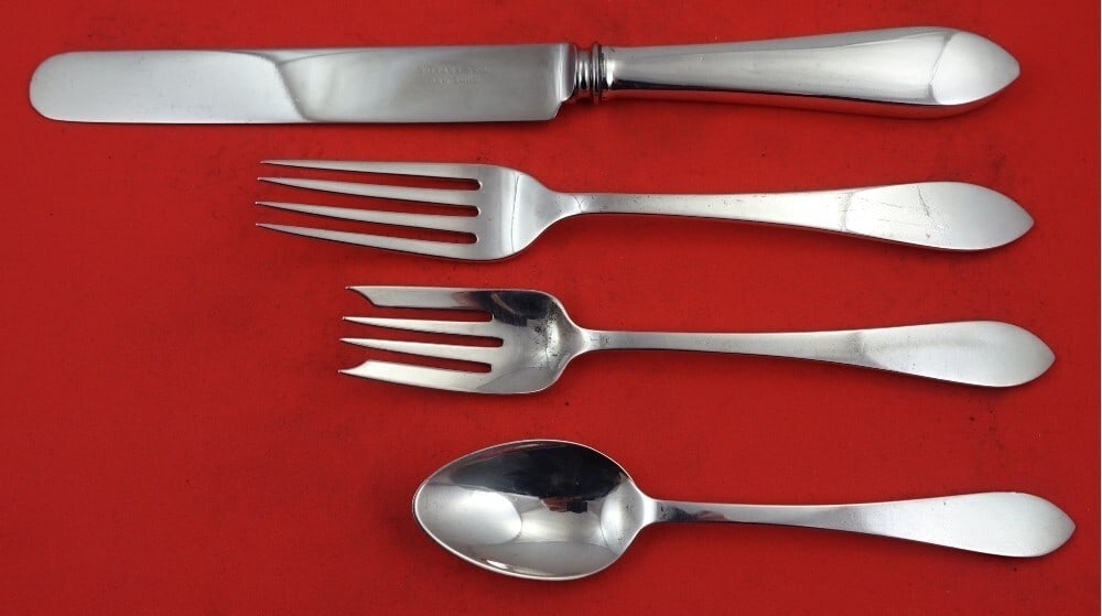 Tiffany & Co Faneuil Sterling Silver 4-Piece Dinner Place Setting: Tiffany & Co Faneuil Sterling Silver 4-Piece Dinner Place Setting Elevate your dining experience with this exquisite 4-piece place setting from the Faneuil pattern by Tiffany & Co. Crafted from high-q