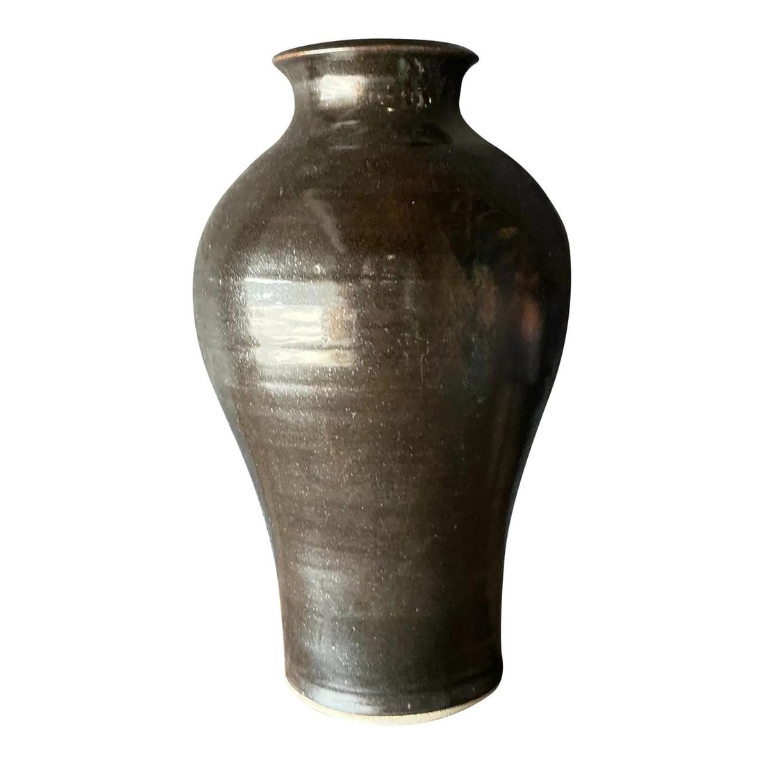 Tall Black Studio Pottery Vase with Dark Glaze and Copper Highlights: Tall Black Studio Pottery Vase with Dark Glaze and Copper Highlights This vintage studio pottery vase features a substantial baluster silhouette with a generous, rounded shoulder, narrowing at the foo