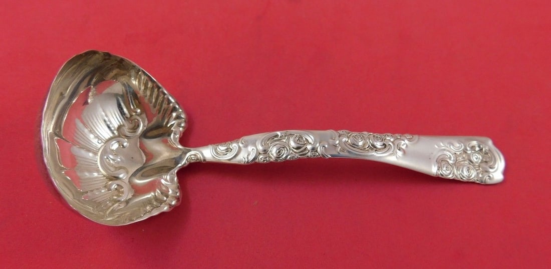 Whiting Rose and Scroll Sterling Silver Gravy Ladle 7 1/2 inches: Whiting Rose and Scroll Sterling Silver Gravy Ladle 7 1/2 inches This exquisite gravy ladle from the Rose and Scroll pattern by Whiting showcases a beautiful design in the bowl, measuring 7 1/2 inches