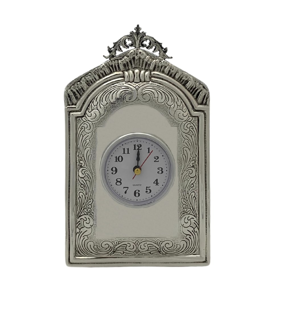 Handmade 925 Sterling Silver Leaf Design Quartz Table Clock: Handmade 925 Sterling Silver Leaf Design Quartz Table Clock Enhance your decor with this exquisite 925 Sterling Silver handmade chased ornate leaf table clock. This stunning piece features intricate s