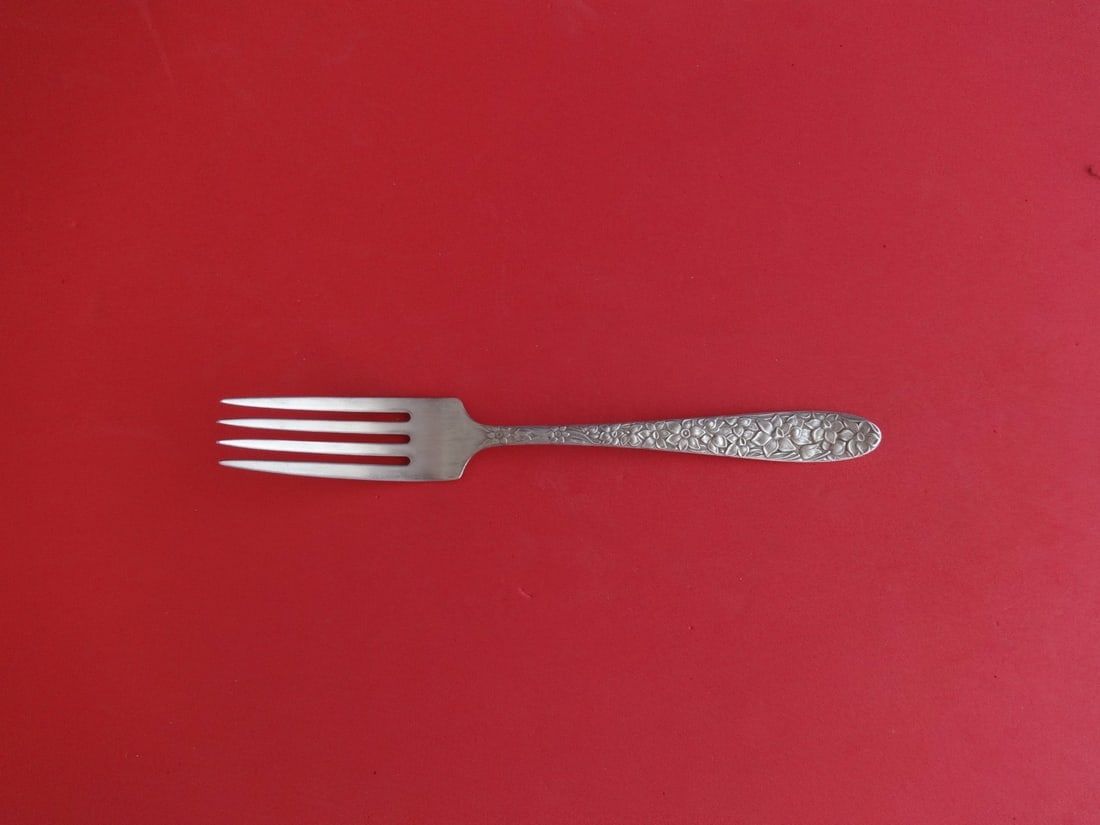 National Narcissus Sterling Silver 7 Inch Regular Fork: National Narcissus Sterling Silver 7 Inch Regular Fork This is a sterling silver regular fork in the Narcissus pattern by National. Crafted in the United States between 1900 and 1940, this fork featur