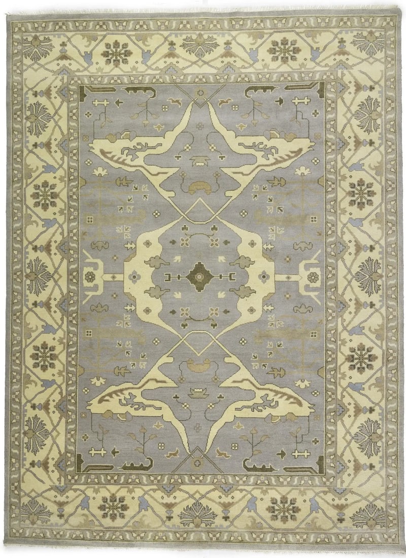 Muted Floral Wool Area Rug 10'2 x 13'8 Hand-Knotted Oushak Design: Muted Floral Wool Area Rug 10'2 x 13'8 Hand-Knotted Oushak Design This handmade Oushak-style Oriental rug features a large, muted floral pattern with distressed details for a modern yet traditional lo