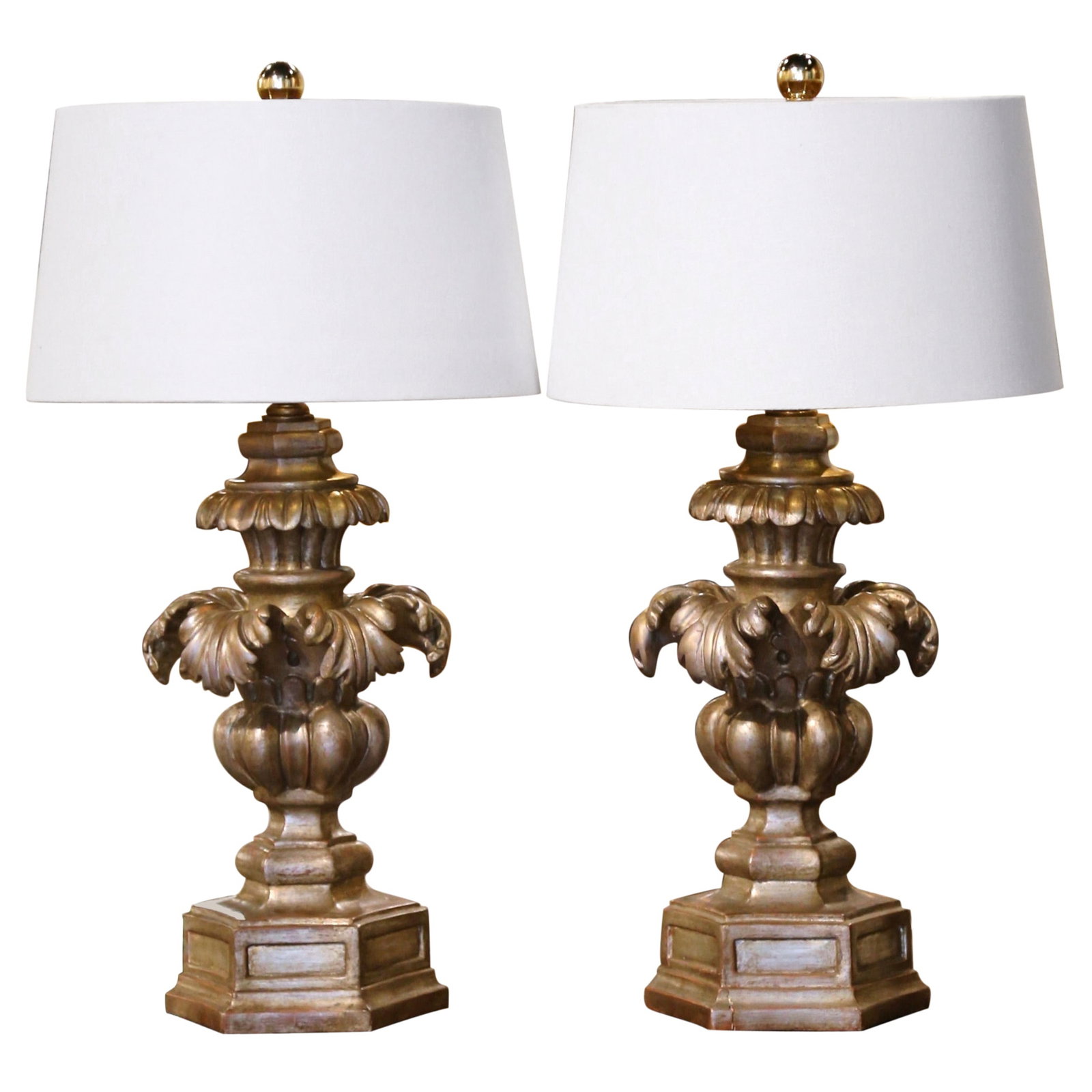 Set of 2 Italian Neoclassical Silver Leaf Carved Wood Table Lamps Circa 1970: Set of 2 Italian Neoclassical Silver Leaf Carved Wood Table Lamps Circa 1970 This pair of mid-century Italian table lamps features hand-carved wood bases finished in silver leaf with subtle gilt accen