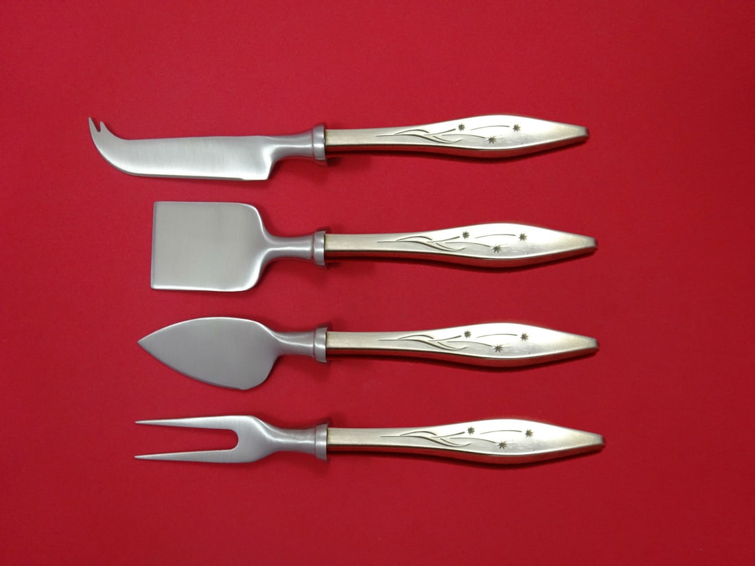 Reed & Barton Star Sterling Silver 4pc Cheese Serving Set: Reed & Barton Star Sterling Silver 4pc Cheese Serving Set Elevate your entertaining experience with this exquisite 4-piece Cheese Serving Set by Reed & Barton. Crafted from sterling silver with a holl