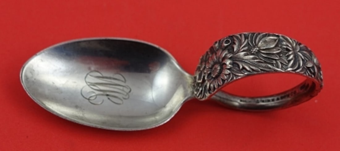 Kirk Repousse Sterling Silver Baby Spoon with Bent Handle 3 1/4": Kirk Repousse Sterling Silver Baby Spoon with Bent Handle 3 1/4" This exquisite baby spoon from Kirk features a charming Repousse pattern and a bent handle, measuring 3 1/4 inches in length. Crafted f