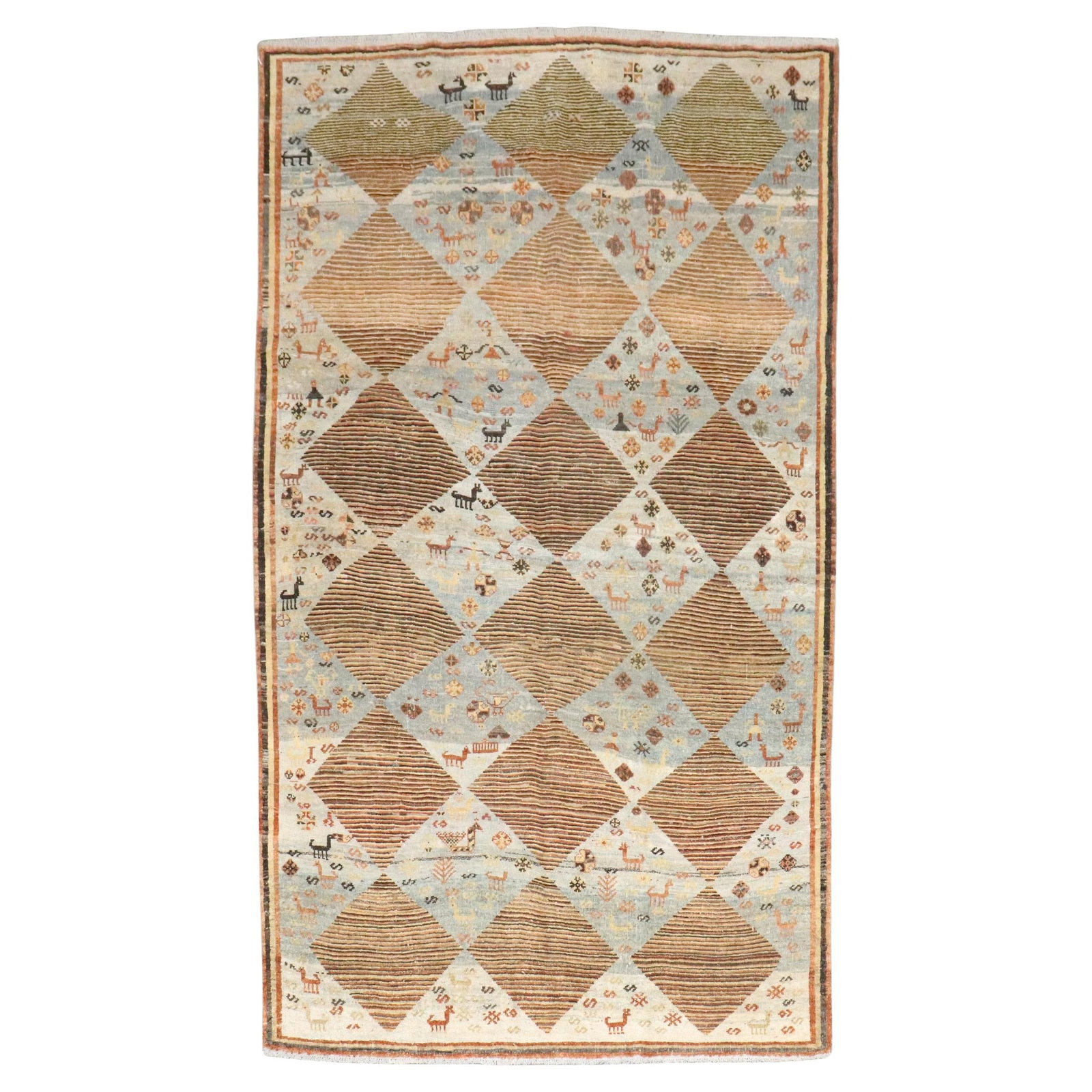 Mid-20th Century Persian Gabbeh Tribal Wool Rug 5'6" x 8'9": Mid-20th Century Persian Gabbeh Tribal Wool Rug 5'6" x 8'9" This vintage Persian Gabbeh rug features a tribal design and was hand-knotted from wool in the mid-20th century. The rug is intermediate in 