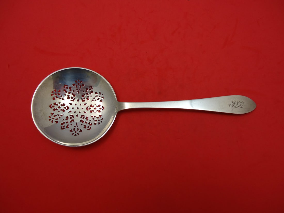 Tiffany & Co. Faneuil Sterling Silver 9 Inch Pierced Pea Spoon: Tiffany & Co. Faneuil Sterling Silver 9 Inch Pierced Pea Spoon This exquisite pea spoon, crafted by Tiffany & Co., features a classic pierced design and measures 9 inches in length. Made from high-qua