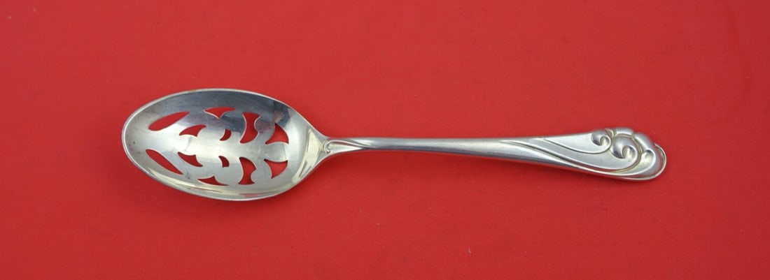 Kirk Dancing Surf Sterling Silver 8" Pierced Serving Spoon: Kirk Dancing Surf Sterling Silver 8" Pierced Serving Spoon Enhance your dining experience with this exquisite 8" pierced serving spoon from the Dancing Surf pattern by Kirk. Crafted from high-quality 