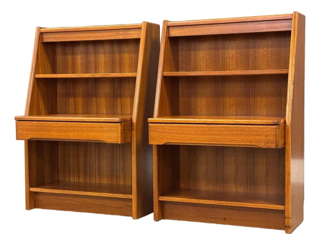 Pair of 1970s Danish Modern Teak Nightstands with Shelves: Pair of 1970s Danish Modern Teak Nightstands with Shelves This exquisite pair of 1970s Danish Modern nightstands showcases a sleek design typical of mid-century modern aesthetics. Each nightstand feat