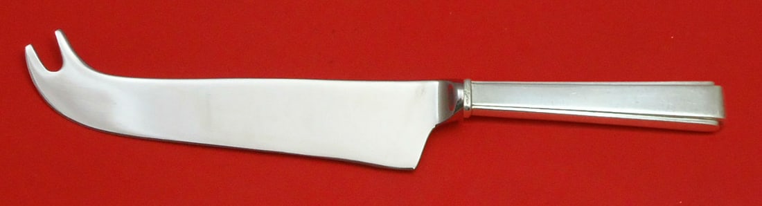 Lunt Modern Classic Sterling Cheese Knife with Pick Hollow Handle: Lunt Modern Classic Sterling Cheese Knife with Pick Hollow Handle A custom made cheese knife with pick in the Modern Classic pattern by Lunt. It features a sterling silver hollow handle with a stainle
