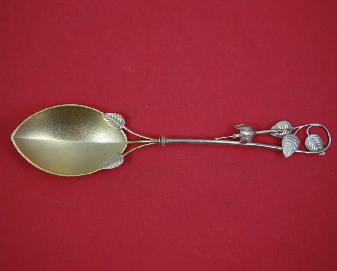 Whiting Fuchsia berry spoon sterling silver gold washed frosted 9 3/4: Whiting Fuchsia berry spoon sterling silver gold washed frosted 9 3/4 This is a Whiting Fuchsia berry spoon made of sterling silver with a gold-washed and frosted finish. It is not monogrammed and is 