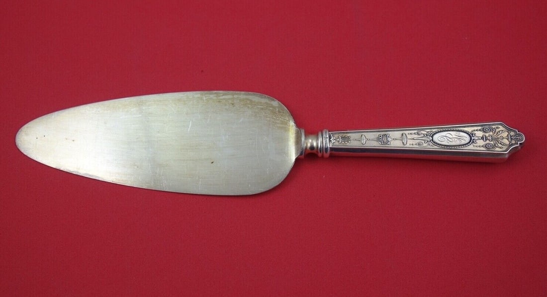 Lunt Adam Sterling Silver Cake Server 10 Inch Plated Blade: Lunt Adam Sterling Silver Cake Server 10 Inch Plated Blade This elegant cake server from the Adam pattern by Lunt is crafted from sterling silver, featuring a plated wide blade measuring 10 inches.