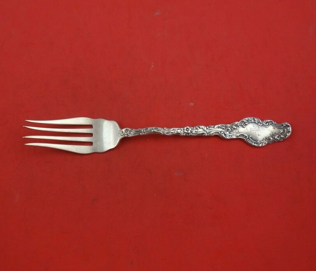 Durgin Watteau Sterling Silver Fish Fork 7 3/8 Inch Heirloom: Durgin Watteau Sterling Silver Fish Fork 7 3/8 Inch Heirloom This exquisite fish fork from the Watteau pattern by Durgin is a stunning example of heirloom silverware, crafted from sterling silver.
