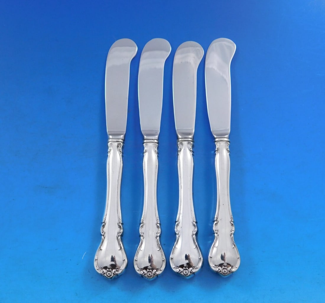 Towle French Provincial Sterling Silver Butter Spreaders Set of 4: Towle French Provincial Sterling Silver Butter Spreaders Set of 4 This elegant set of four butter spreaders features the classic French Provincial pattern by Towle. Each spreader is crafted from high-