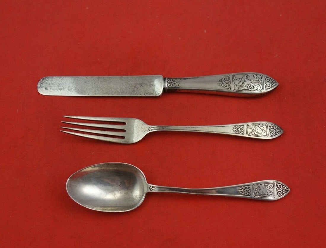 Tiffany & Co Sterling Silver 3 Piece Junior Set Rooster Hawk Owl: Tiffany & Co Sterling Silver 3 Piece Junior Set Rooster Hawk Owl This exquisite Tiffany & Co. Sterling Silver Junior Set features three charming pieces, each adorned with unique motifs: a knife with a