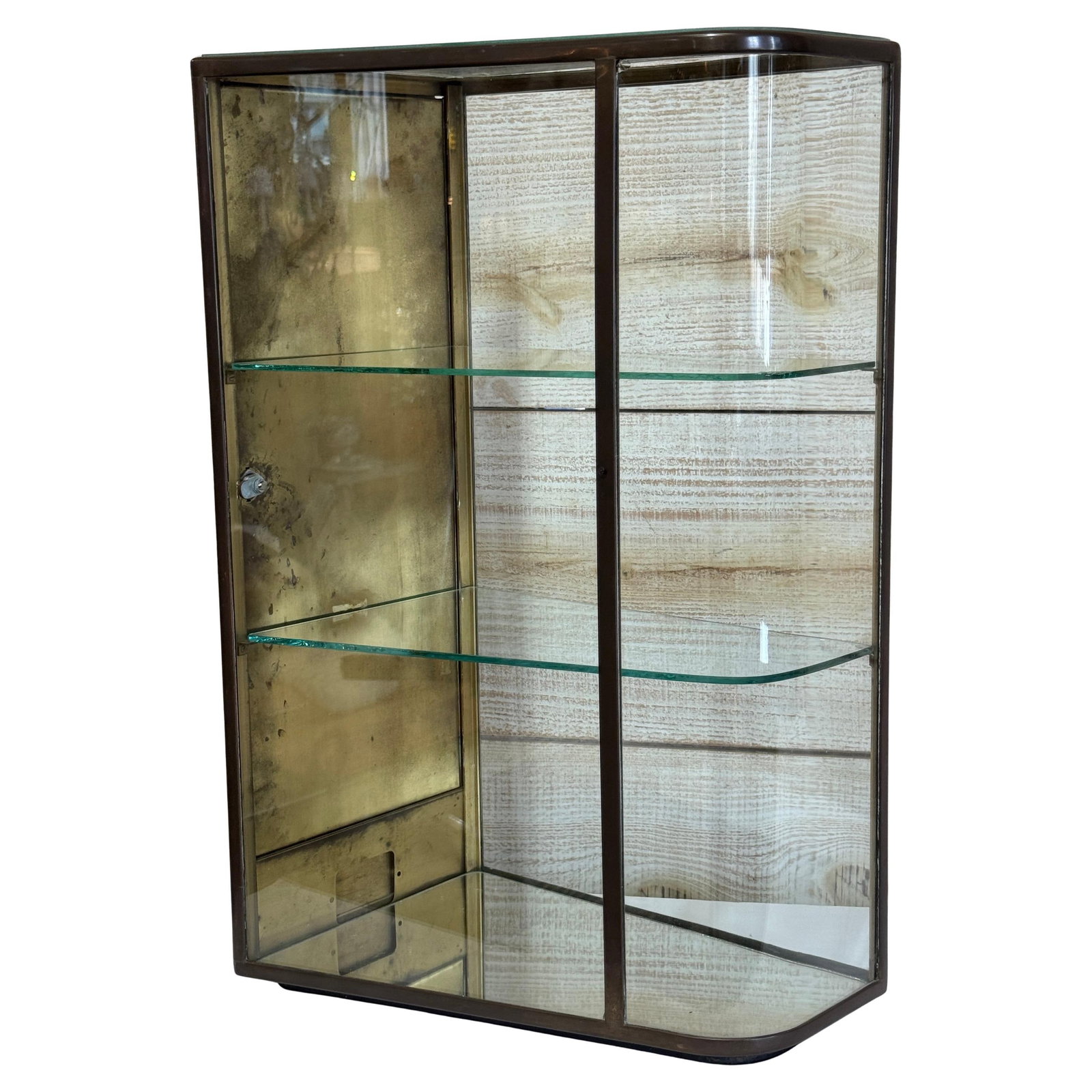 Belle Epoque Paris Bronze and Glass Tabletop Display Vitrine Circa 1900: Belle Epoque Paris Bronze and Glass Tabletop Display Vitrine Circa 1900 This French Belle Epoque vitrine from Paris, circa 1900, features an angled rectangular form with a convex front and gently curv
