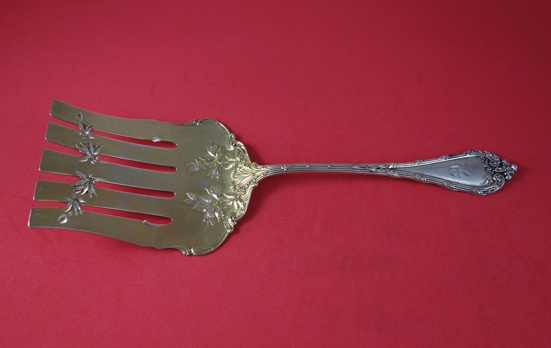 Durgin Madame Royale Sterling Silver Gold Washed Asparagus Fork 9 3/4": Durgin Madame Royale Sterling Silver Gold Washed Asparagus Fork 9 3/4" This exquisite asparagus fork is a stunning piece from the Madame Royale pattern by Durgin, crafted from high-quality sterling si
