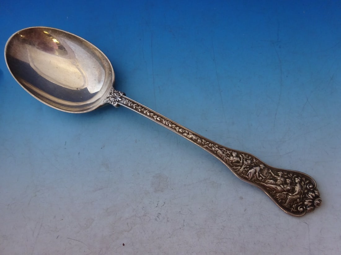 Tiffany & Co Olympian Sterling Silver Vegetable Serving Spoon 9.5": Tiffany & Co Olympian Sterling Silver Vegetable Serving Spoon 9.5" This exquisite 9 1/2" vegetable serving spoon is part of the Olympian pattern by Tiffany & Co., crafted from high-quality sterling si