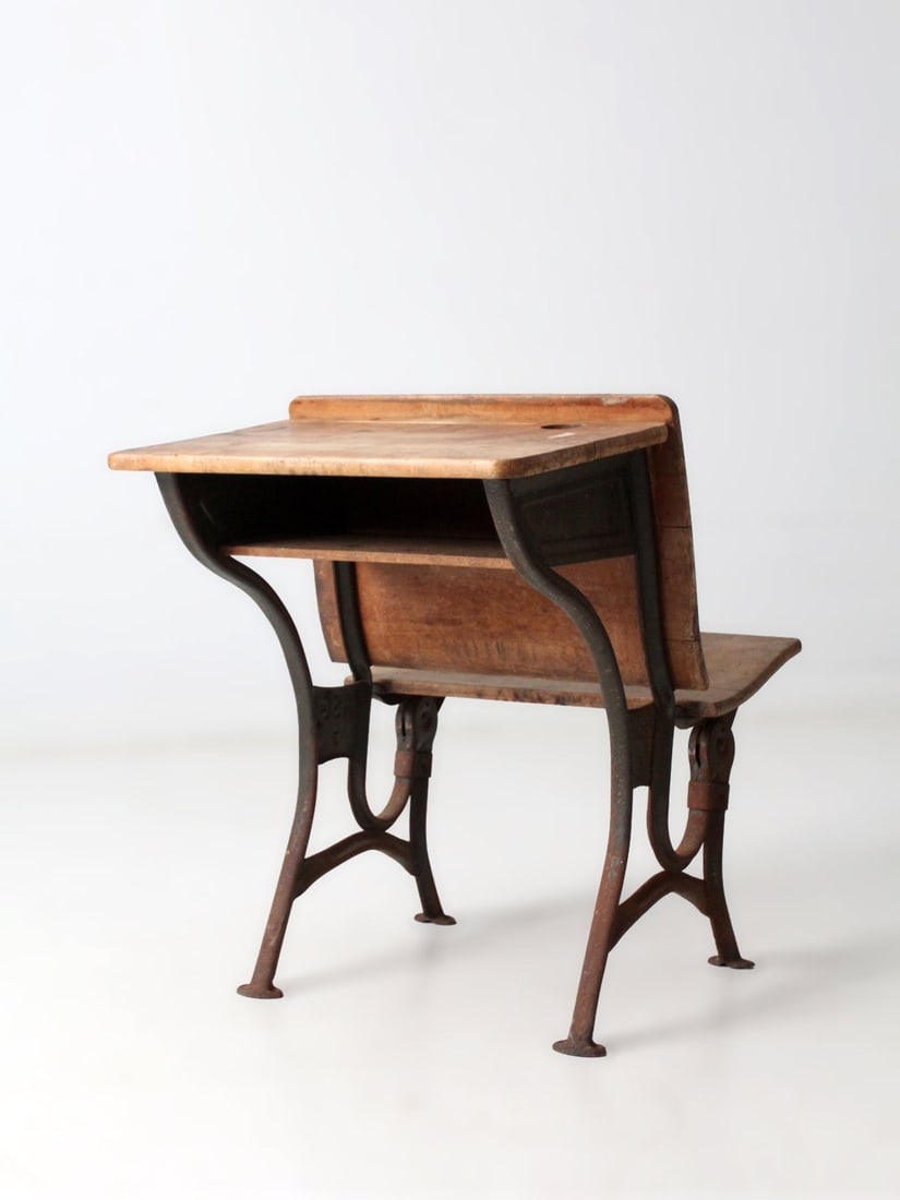 Early 20th Century School Desk With Curved Steel Base and Wood Top: Early 20th Century School Desk With Curved Steel Base and Wood Top This early 20th century school desk by American Seating Co features a curved bent steel base with a solid wood writing surface and se