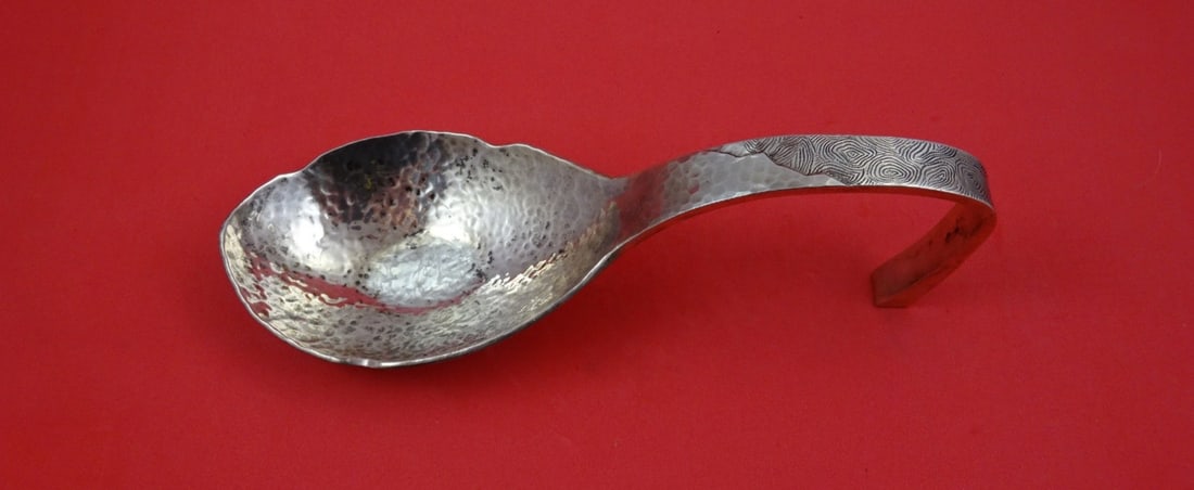 Sterling Silver Pudding Spoon Hand Hammered by Shiebler 7 5/8 Inch: Sterling Silver Pudding Spoon Hand Hammered by Shiebler 7 5/8 Inch This Shiebler sterling silver pudding spoon features a hand-hammered finish with a brite-cut design and an added rest. Crafted in the