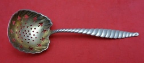 Whiting Sterling Silver Oval Twist Sugar Sifter 5 1/4 Inch: Whiting Sterling Silver Oval Twist Sugar Sifter 5 1/4 Inch Introducing the Oval Twist Sugar Sifter by Whiting, a stunning piece crafted from high-quality sterling silver. This elegant serving piece fe