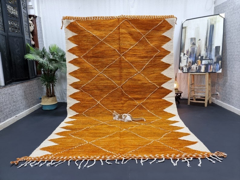 Authentic Handwoven Moroccan Berber Wool Rug 9.84 x 6.56 Feet: Authentic Handwoven Moroccan Berber Wool Rug 9.84 x 6.56 Feet Add a touch of elegance to your home with this stunning handwoven Moroccan Berber wool rug. Crafted by talented local Berber women in the 
