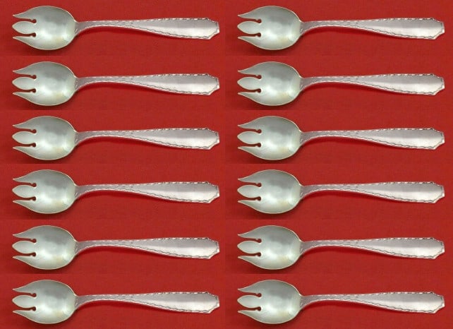 Tiffany & Co Marquise Sterling Silver Ice Cream Fork Set 12pc: Tiffany & Co Marquise Sterling Silver Ice Cream Fork Set 12pc Indulge in the elegance of the Marquise pattern by Tiffany & Co. This exquisite set features 12 custom-made sterling silver ice cream fork