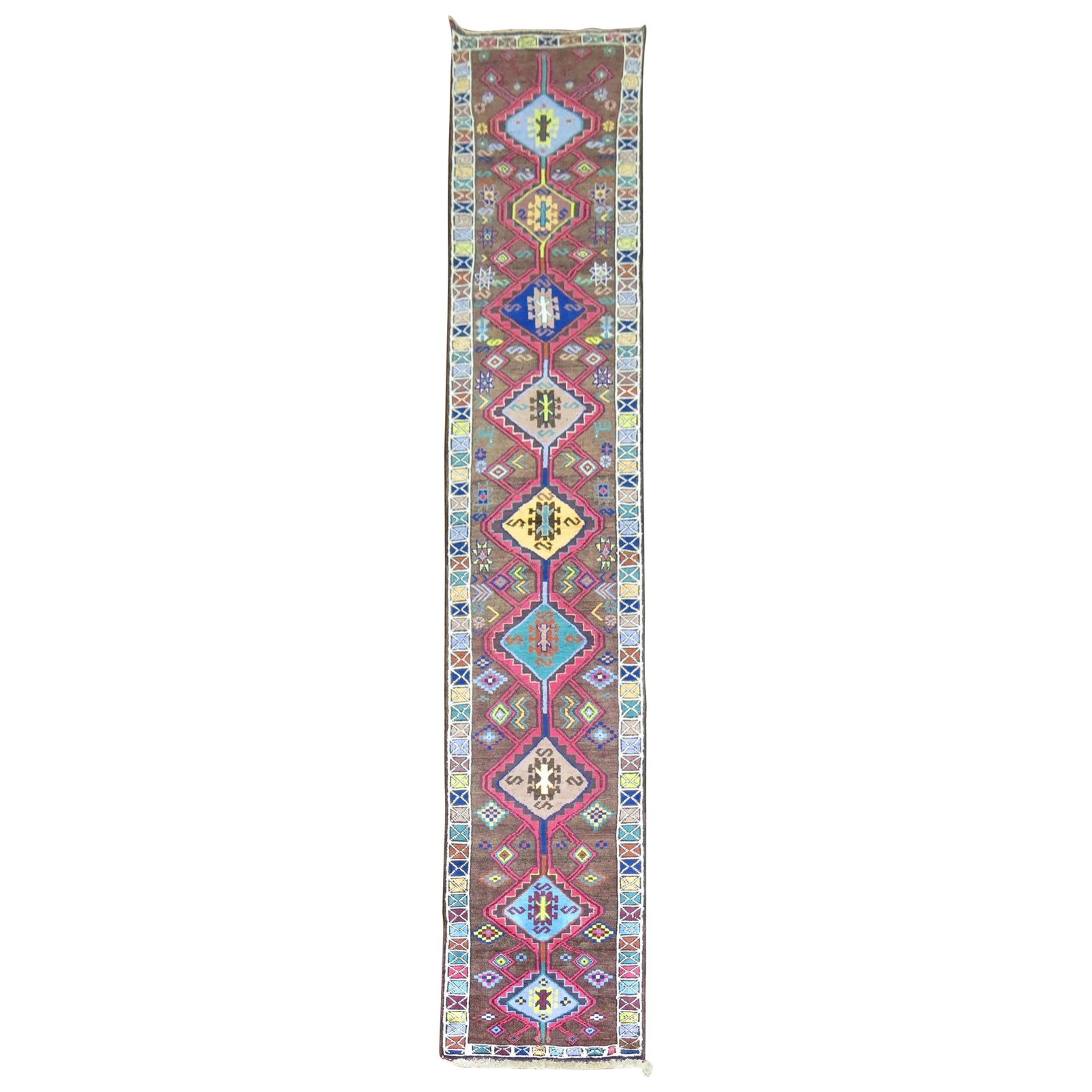 Mid-Century Turkish Anatolian Wool Runner with Vibrant Geometric Design: Mid-Century Turkish Anatolian Wool Runner with Vibrant Geometric Design This vintage Turkish Anatolian runner from the mid-20th century features a vibrant mix of electric colors and a geometric all-ov