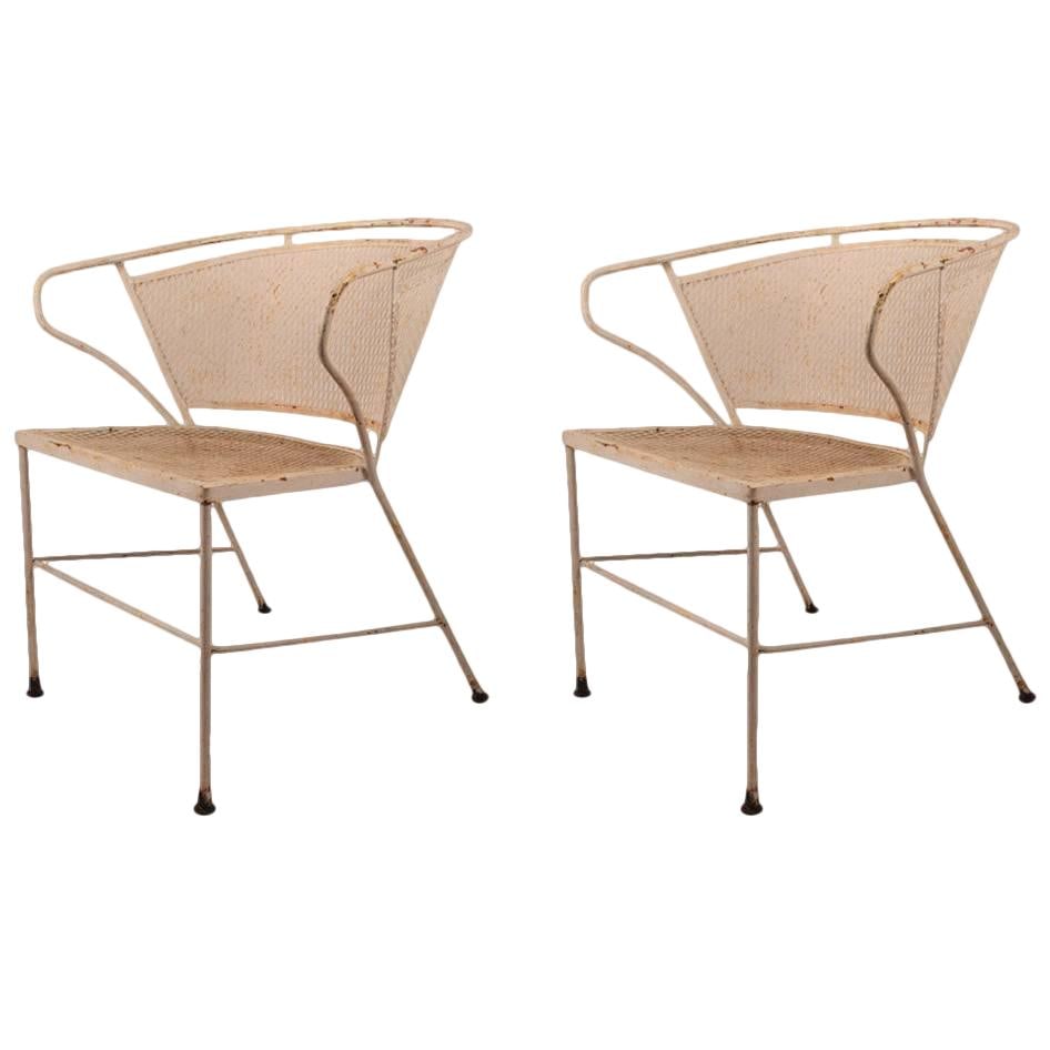 Vintage Wrought Iron Garden Chairs Pair by Woodard: Vintage Wrought Iron Garden Chairs Pair by Woodard Enhance your outdoor space with this charming pair of wrought iron and metal mesh garden chairs, attributed to Woodard. Featuring a unique wraparound