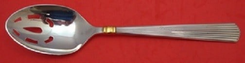 Reed and Barton Ashmont Gold Sterling Silver Slotted Serving Spoon 8 3/4": Reed and Barton Ashmont Gold Sterling Silver Slotted Serving Spoon 8 3/4" This exquisite Ashmont Gold serving spoon from Reed and Barton is crafted from high-quality sterling silver. The spoon feature