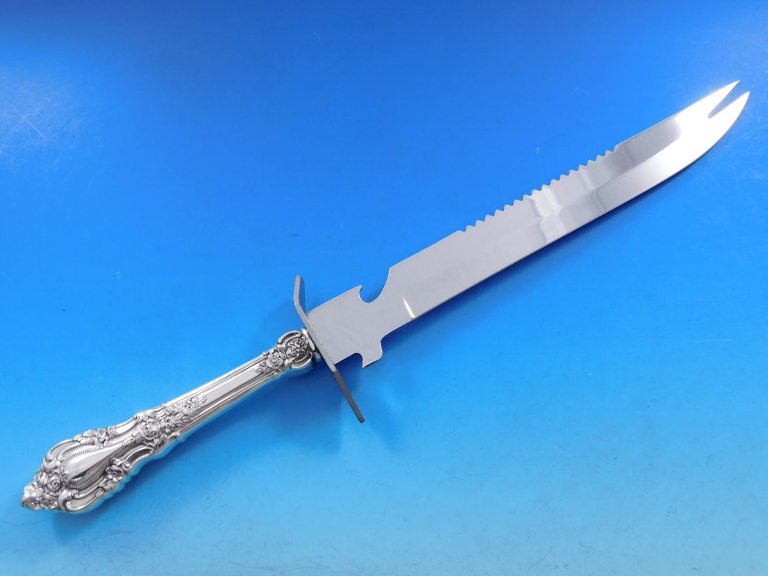 Lunt Eloquence Sterling Silver Ham Slice Knife Custom Made 11 7/8": Lunt Eloquence Sterling Silver Ham Slice Knife Custom Made 11 7/8" This Eloquence ham slice knife by Lunt is a custom-made piece crafted from sterling silver. Measuring a total length of 11 7/8", it f