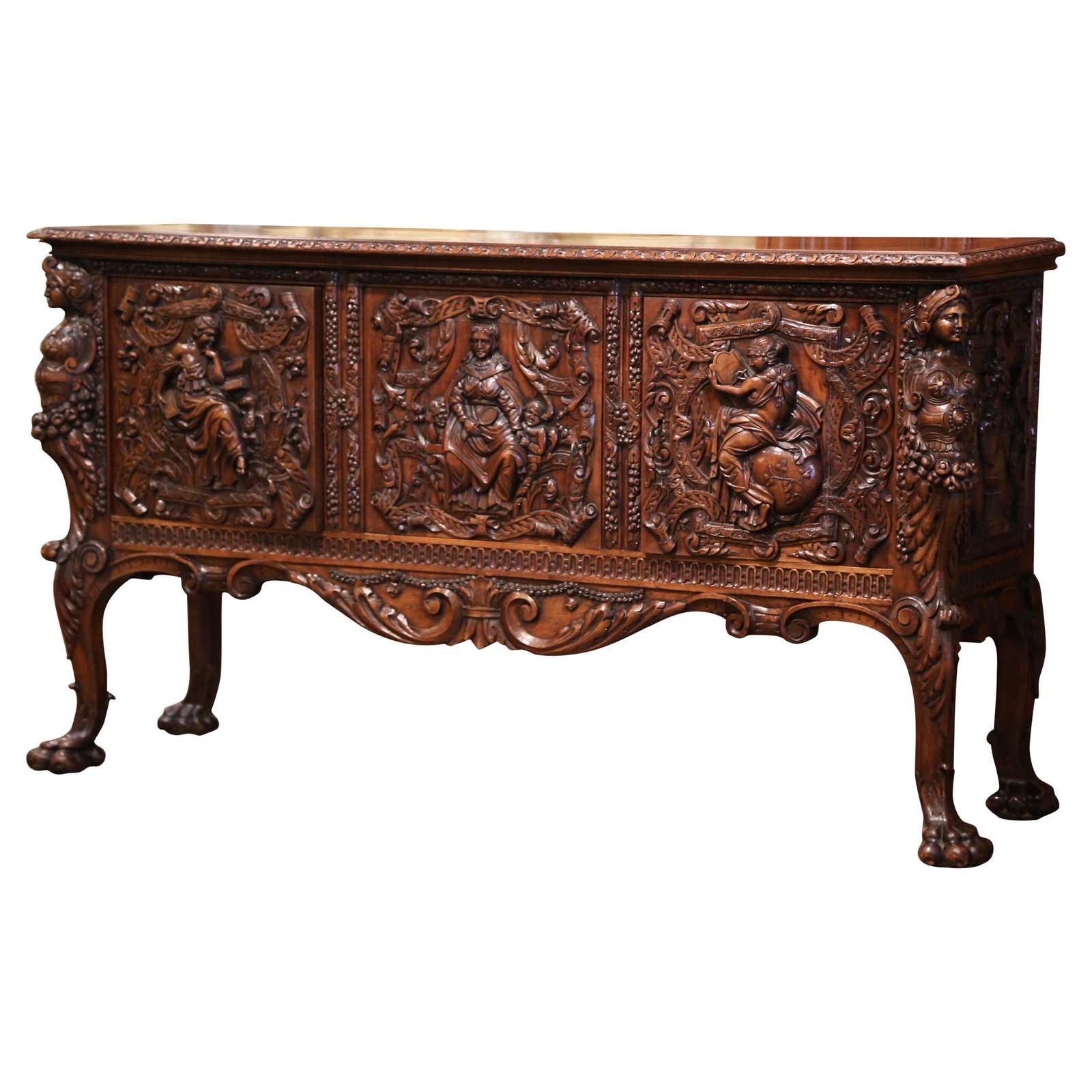 Italian Renaissance Walnut Credenza with Figural Panels: Italian Renaissance Walnut Credenza with Figural Panels This mid-19th century Italian Renaissance Revival credenza is masterfully crafted from solid walnut and features exceptional hand-carved details