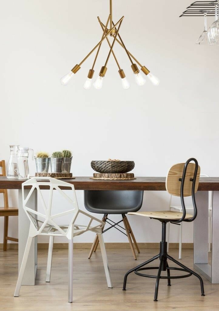 Lucca Brass 6-Light Modern Sputnik Pendant Chandelier: Lucca Brass 6-Light Modern Sputnik Pendant Chandelier This modern Sputnik-style pendant chandelier features six adjustable crossing arms mounted on a central rod, allowing you to direct light in any d