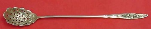 Whiting Sterling Silver Olive Spoon Lily of the Valley 9 1/8": Whiting Sterling Silver Olive Spoon Lily of the Valley 9 1/8" This exquisite serving spoon features the elegant "Lily of the Valley" pattern by Whiting. Crafted from high-quality sterling silver, this