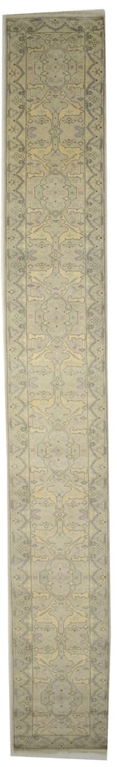 Hand Knotted Wool Floral Oushak Runner 2'8 x 19'9: Hand Knotted Wool Floral Oushak Runner 2'8 x 19'9 Enhance your hallway or kitchen with this stunning 3X20 oversized handmade oriental runner rug designed in a floral Oushak style. Crafted in India, th