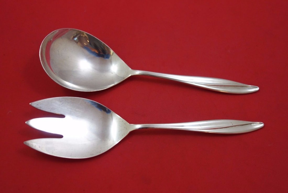 Gorham Firelight Sterling Silver Salad Serving Set 2pc 9 1/4": Gorham Firelight Sterling Silver Salad Serving Set 2pc 9 1/4" Enhance your dining experience with the exquisite Firelight by Gorham Sterling Silver Salad Serving Set. This elegant two-piece set, measu