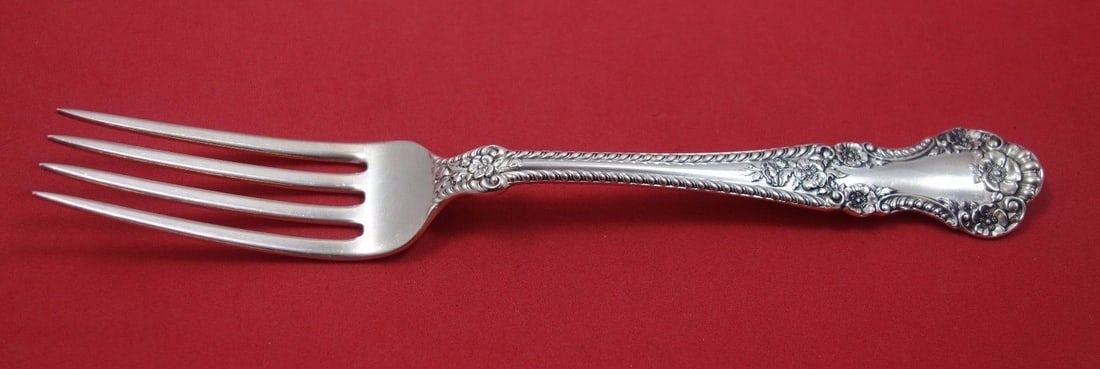 Durgin English Rose Sterling Silver Dinner Fork 7 3/4" Flatware: Durgin English Rose Sterling Silver Dinner Fork 7 3/4" Flatware This exquisite English Rose dinner fork from Durgin is crafted from high-quality sterling silver, showcasing a beautiful floral pattern 