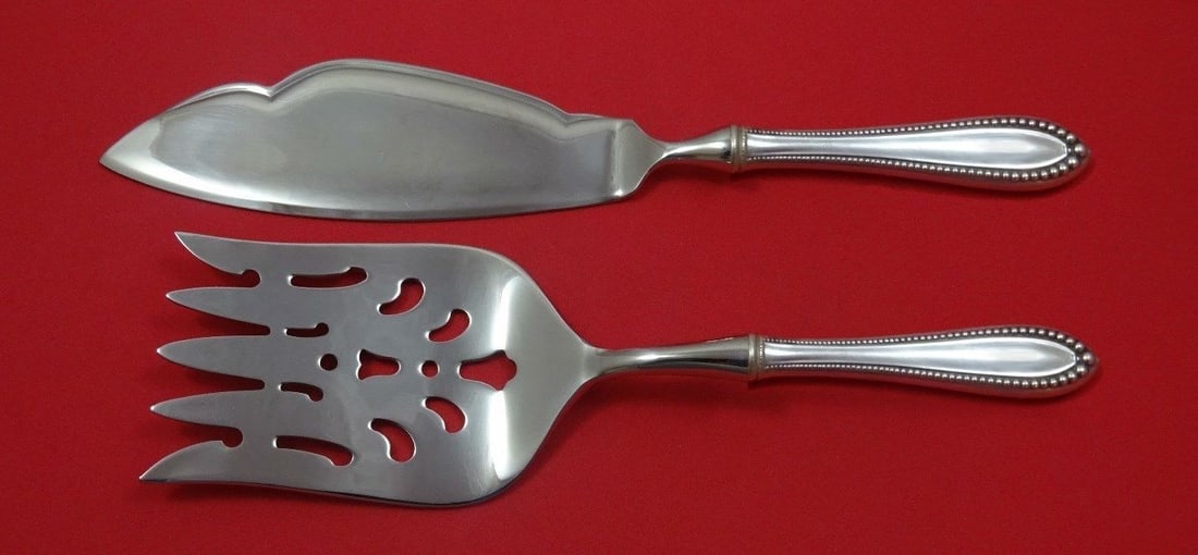Virginia by Gorham Sterling Silver 2 Piece Fish Serving Set: Virginia by Gorham Sterling Silver 2 Piece Fish Serving Set Enhance your dining experience with the Virginia by Gorham Sterling Silver Fish Serving Set. This exquisite 2-piece set showcases a decadent