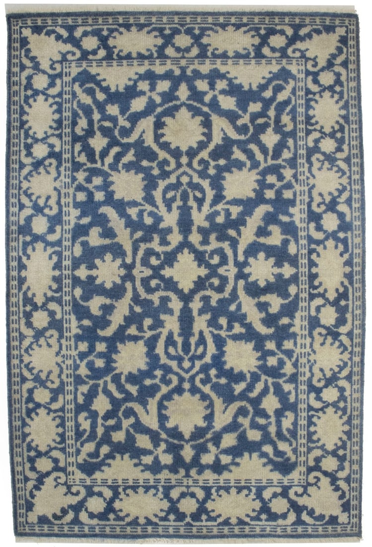 Hand Knotted Wool 4x6 Slate Blue Floral Modern Area Rug: Hand Knotted Wool 4x6 Slate Blue Floral Modern Area Rug This hand-knotted area rug features a classic floral pattern in muted slate blue, cream, and beige tones. Made from wool, it offers a low, norma