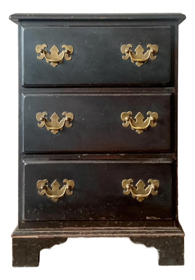 Petite Ebonized Chippendale Style Chest with Brass Batwing Pulls: Petite Ebonized Chippendale Style Chest with Brass Batwing Pulls This vintage petite chest of drawers is inspired by 18th-century Chippendale design and crafted from solid wood with a deep, ebonized b