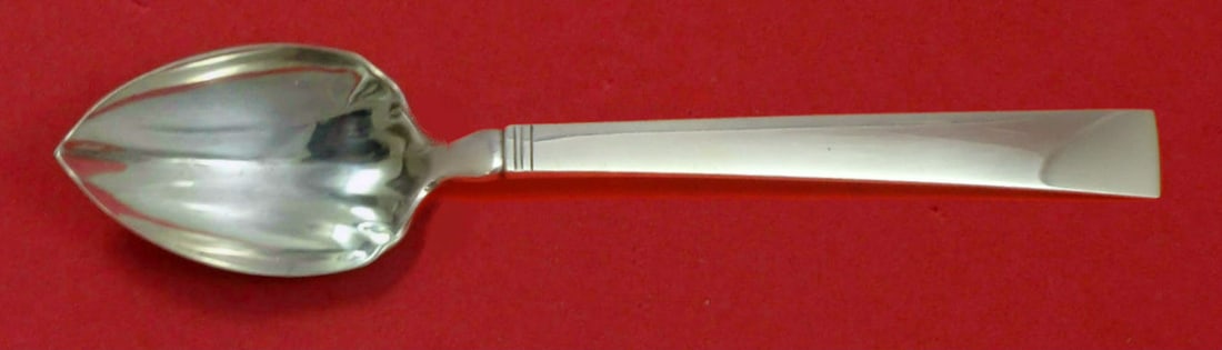 Georg Jensen Blok Acadia Sterling Silver Fluted Grapefruit Spoon: Georg Jensen Blok Acadia Sterling Silver Fluted Grapefruit Spoon This exquisite grapefruit spoon features a fluted design and is crafted from high-quality sterling silver. Made by renowned designer Ge