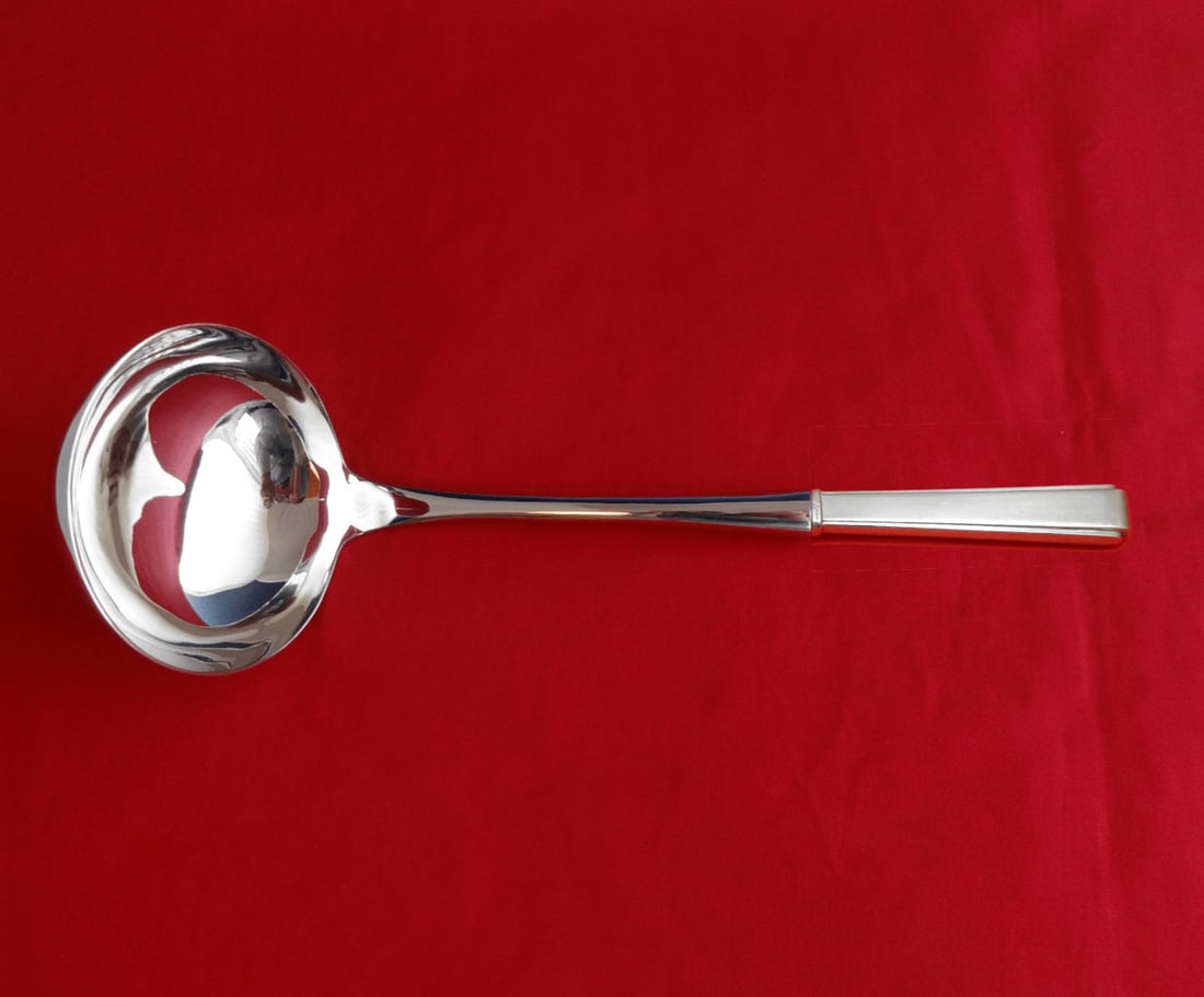 Lunt Modern Classic Sterling Silver Soup Ladle 10 1/2": Lunt Modern Classic Sterling Silver Soup Ladle 10 1/2" Add a touch of elegance to your dining experience with this impressive Modern Classic Soup Ladle by Lunt. Crafted from sterling silver, this ladl