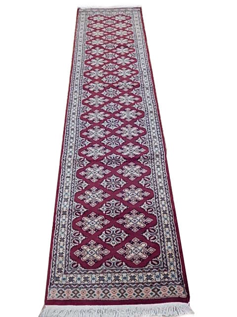 Hand-Knotted 2.6 x 9.9 Red Jaldar Bokhara Area Rug: Hand-Knotted 2.6 x 9.9 Red Jaldar Bokhara Area Rug Free continental US Shipping Enhance your living space with the exquisite 2.6' x 9.9' Red Jaldar Bokhara Rug. This stunning area rug features a timel